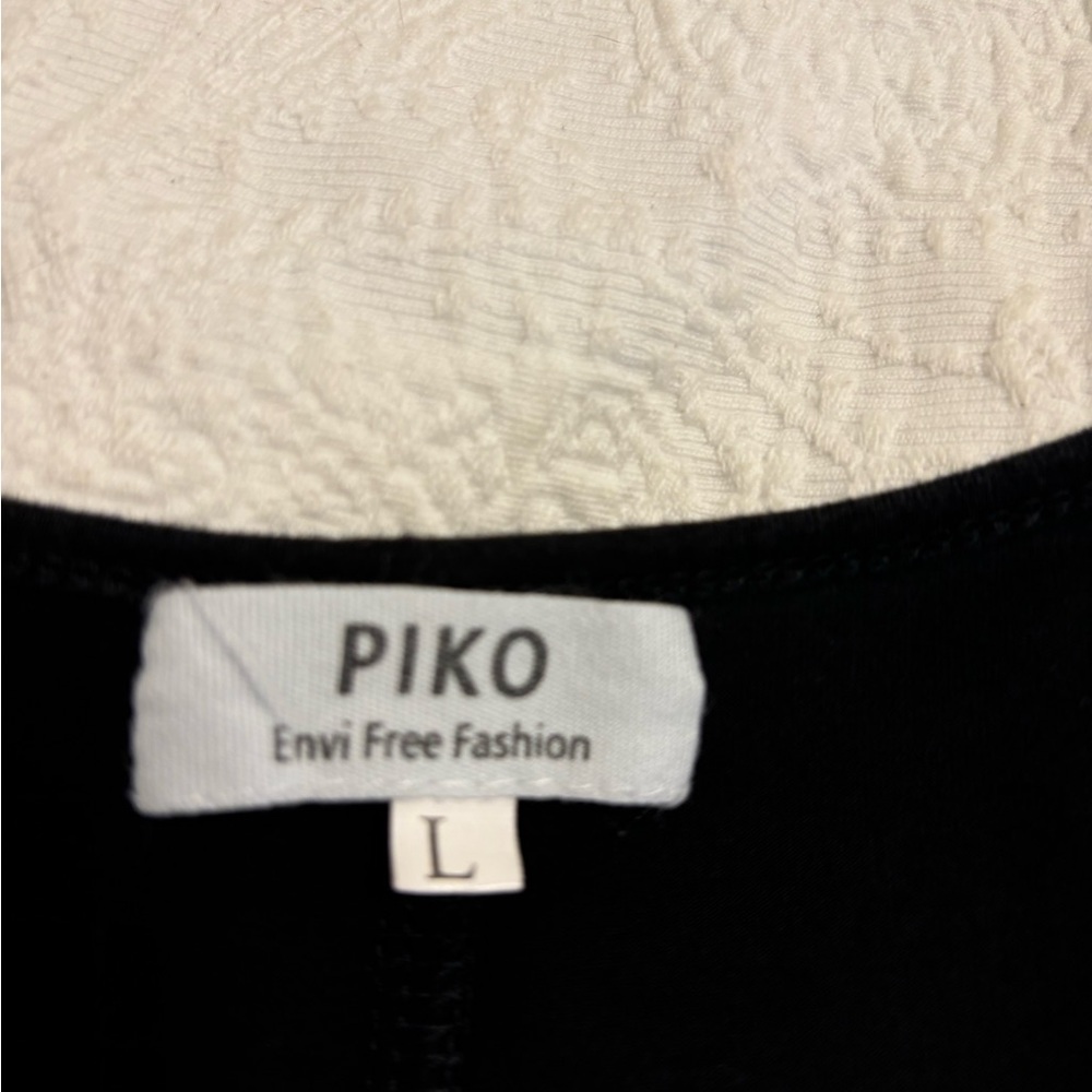 PIKO black Aline sleeveless dress with pockets.